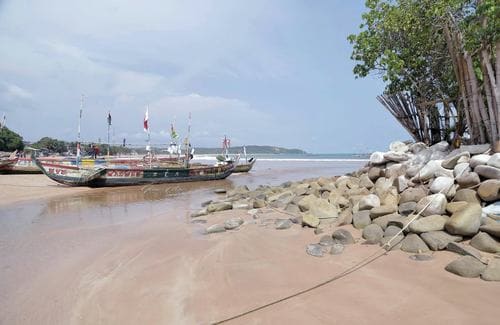 Place to See - Busua Beach Place to See - Fishing boats back from a trip